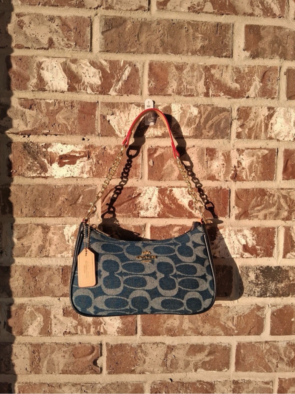 Coach Blue Denim Signature Shoulder Bag with Coral Strap Accent